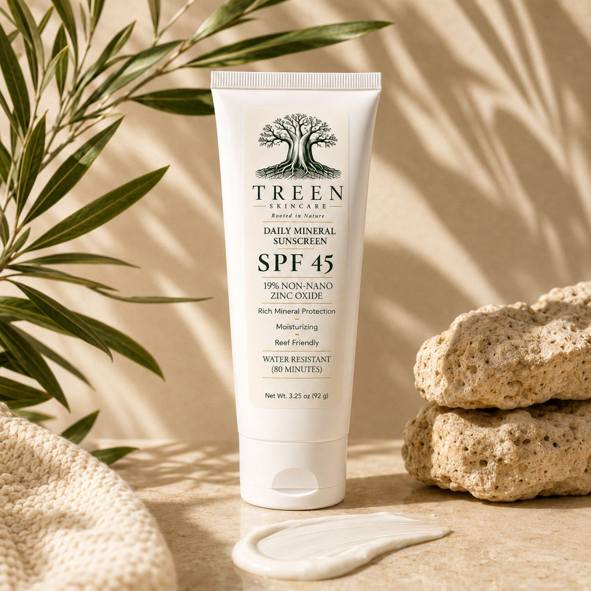 TREEN Mineral Sunscreen SPF 45 tube in a sunlit botanical setting